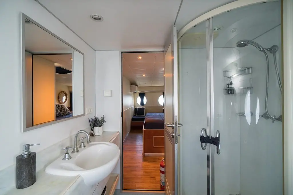 Spotless and modern bathroom interior aboard Haruku private yacht charter Bali