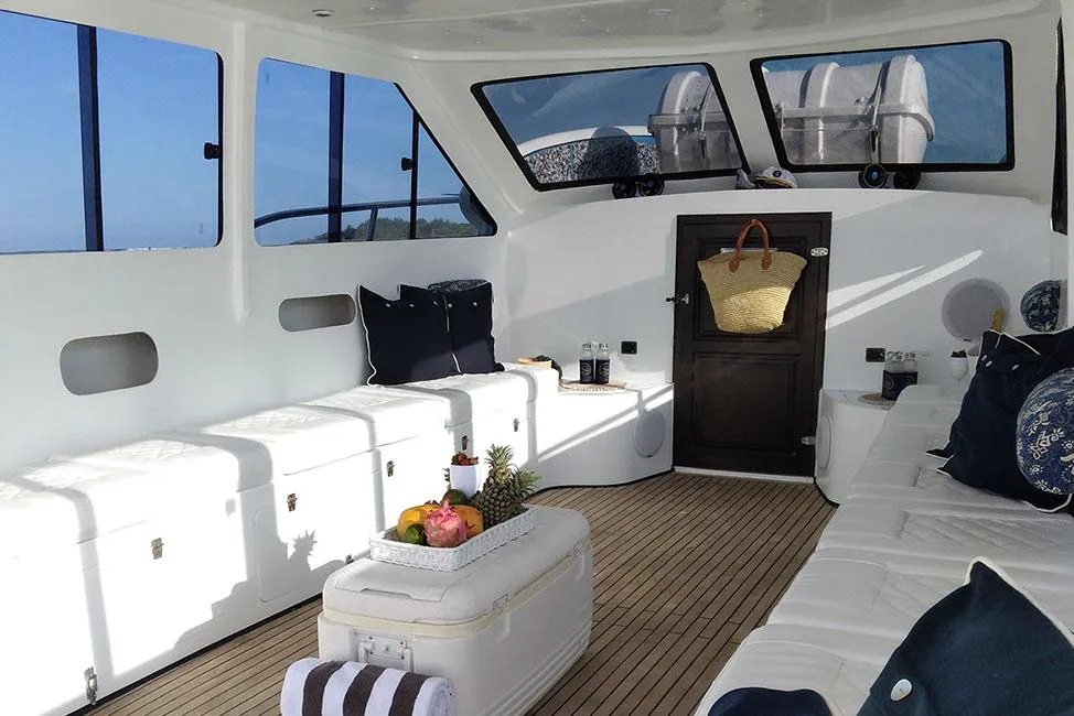 Modern and spacious interior of Suku Bali Cruise boat with comfortable seating